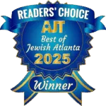 Blue badge with ribbon that reads "Readers' Choice AJT Best of Jewish Atlanta 2025 Winner.