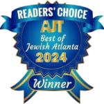 Blue and gold badge reading "READERS' CHOICE AJT Best of Jewish Atlanta 2024 Winner" with ribbon accents.