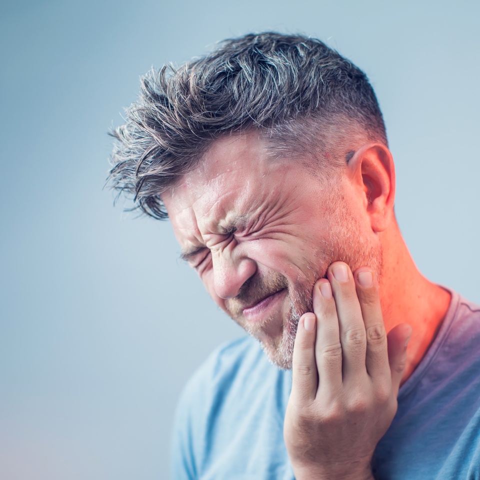 Toothache, medicine, health care concept, Teeth Problem, young man suffering from tooth pain, caries