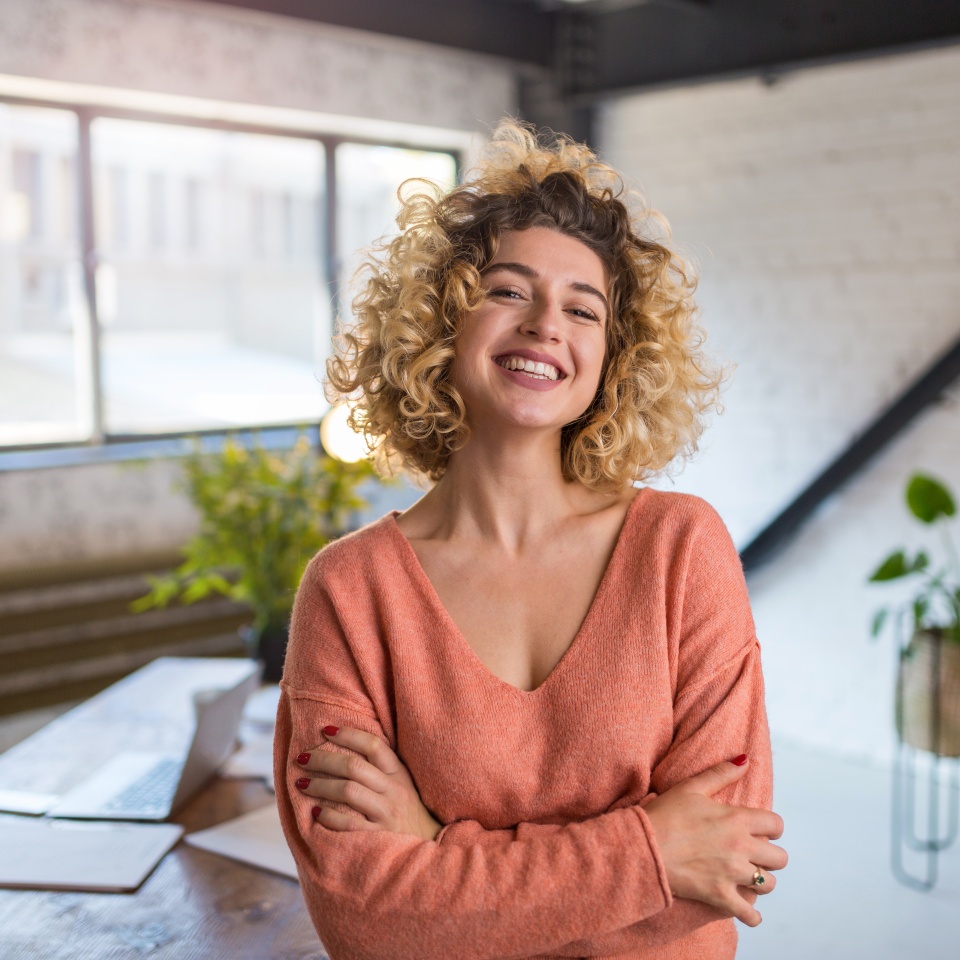 Portrait of confident creative businesswoman in office