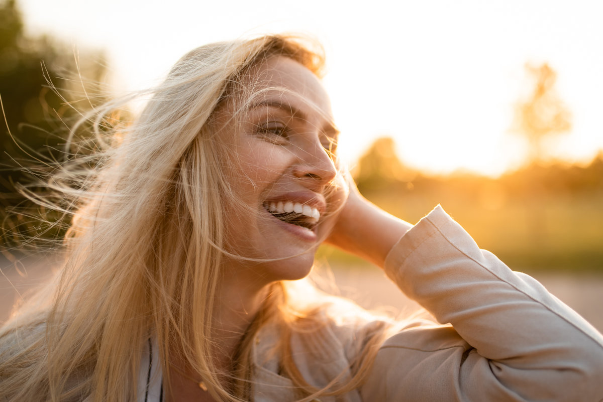 Pretty fashion model posing with big smile